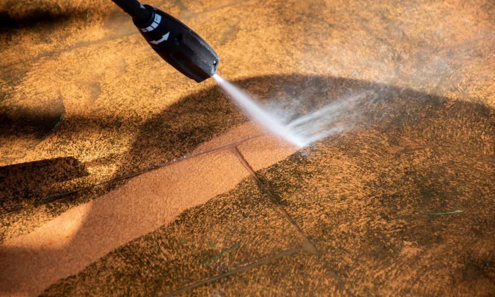 washing-the-backyard-tiles-with-high-pressure-clea-2022-06-15-23-24-36-utc (1)